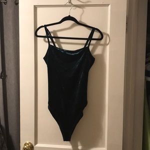 Emerald green velvet crotch snap bodysuit